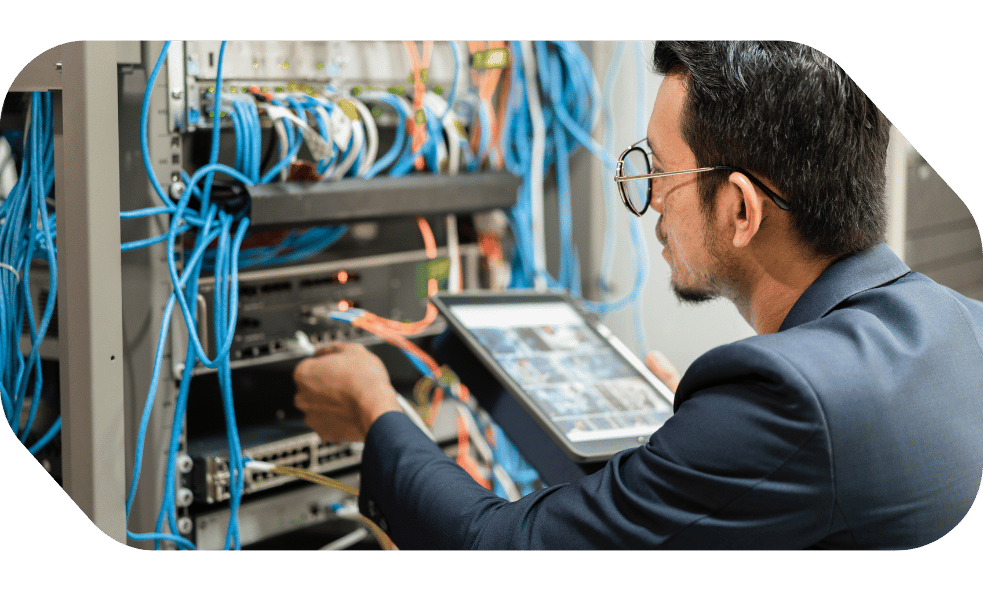 Data center technician maintaining server infrastructure